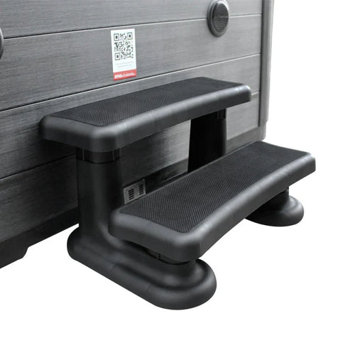 Black 2-tier Eterna spa step with slip-resistant treads, durable weather-resistant construction and stable platform for safe spa and hot tub access.