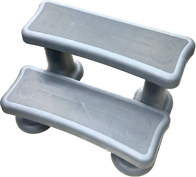 Grey 2-tier Eterna spa step with slip-resistant treads, durable weather-resistant construction and stable platform for safe spa and hot tub access.