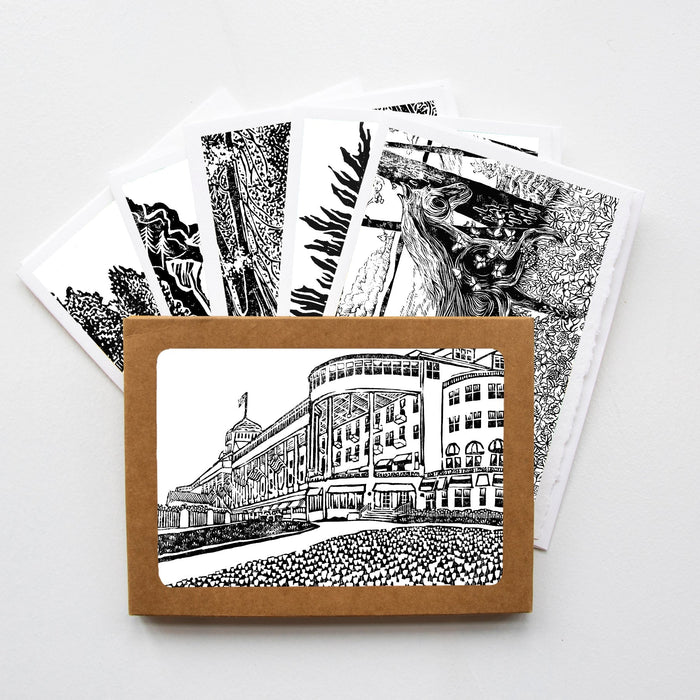 A casually elegant greeting cards featuring digital reproductions of Natalia’s black and white Mackinac Island themed block print designs.