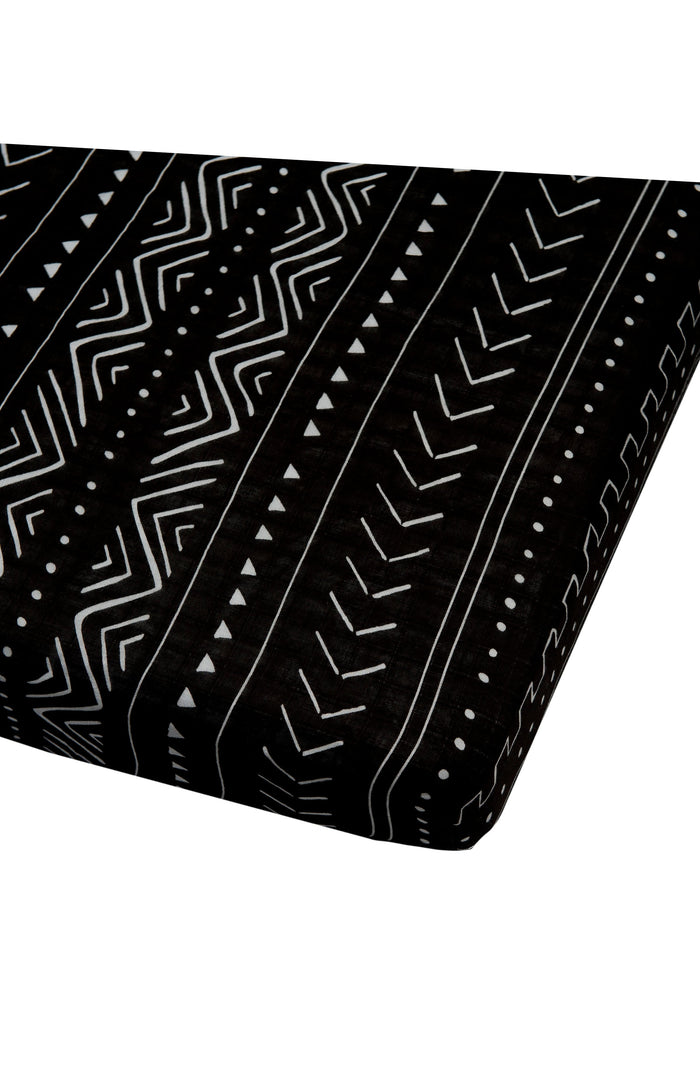 Loulou Lollipop muslin fitted crib sheet in Black Mudcloth for US standard crib — front view on white background
