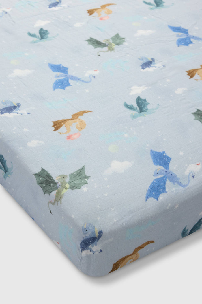 Loulou Lollipop muslin fitted crib sheet in Magical Dragons for US standard crib — front view on white background
