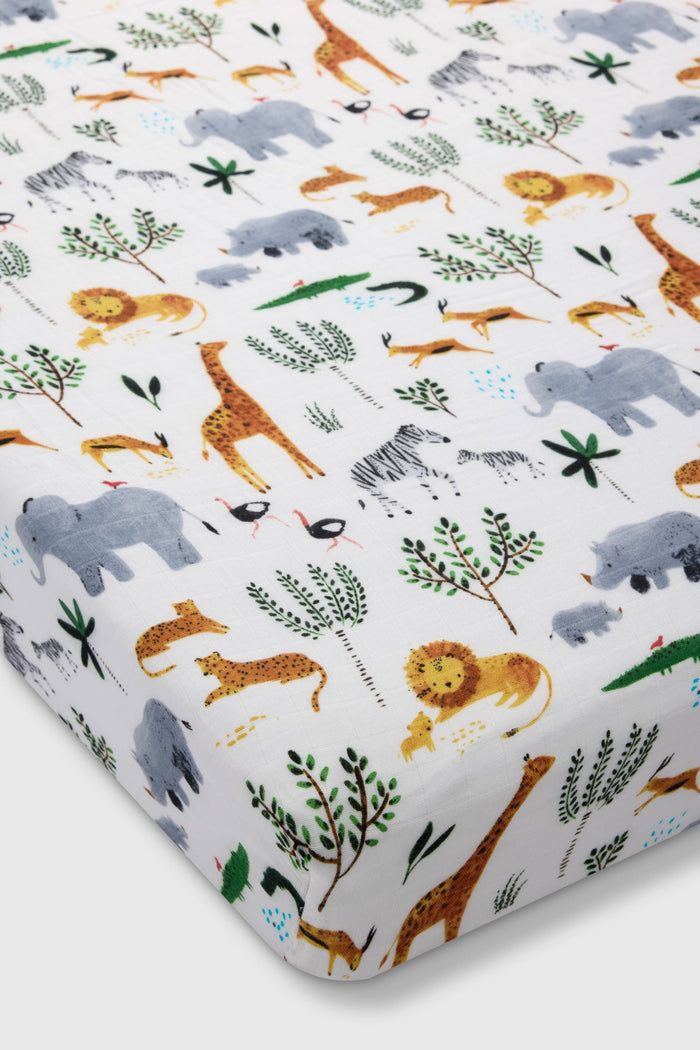 Loulou Lollipop muslin fitted crib sheet in Safari Jungle for US standard crib — front view on white background