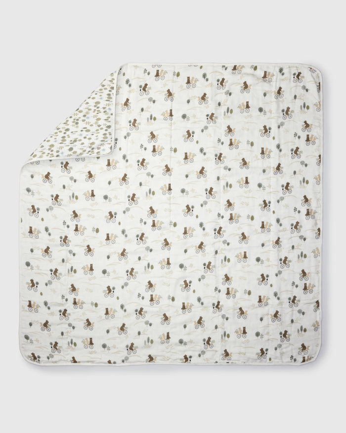 Loulou Lollipop muslin baby quilt blanket in Bears on Bikes — front view on white background