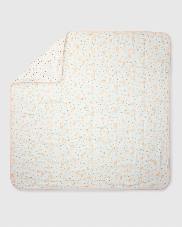 Loulou Lollipop muslin baby quilt blanket in Bunny Meadow — front view on white background