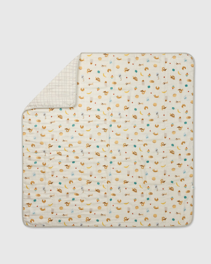 Loulou Lollipop muslin baby quilt blanket in French Breakfast — front view on white background