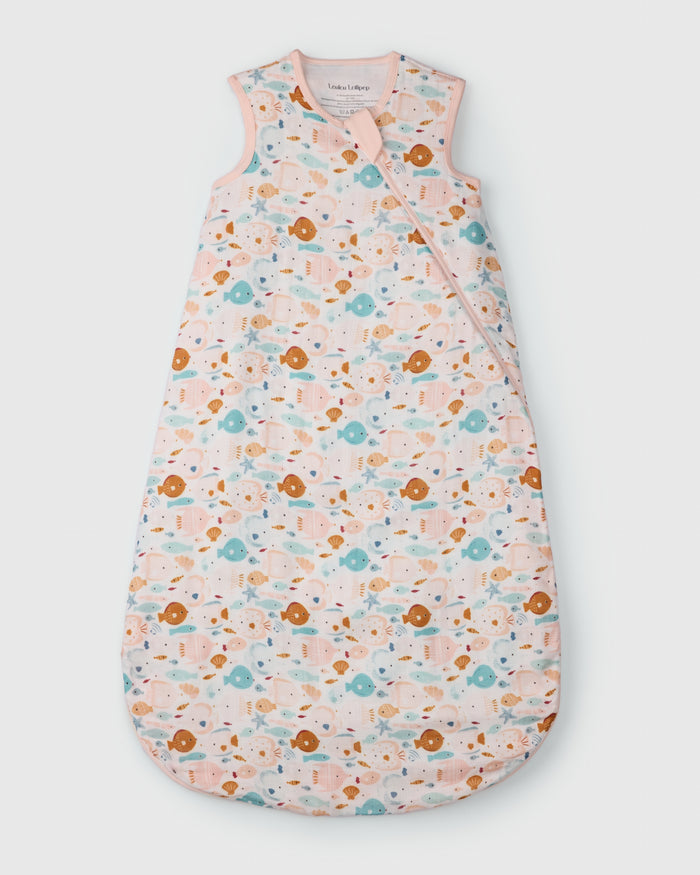 Loulou Lollipop muslin 0.5 TOG lightweight baby sleep bag in Sun Kissed Shoal — front view on white background