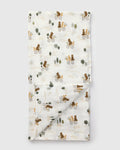 Loulou Lollipop bamboo cotton muslin swaddle blanket in Bears on Bikes — front view on white background