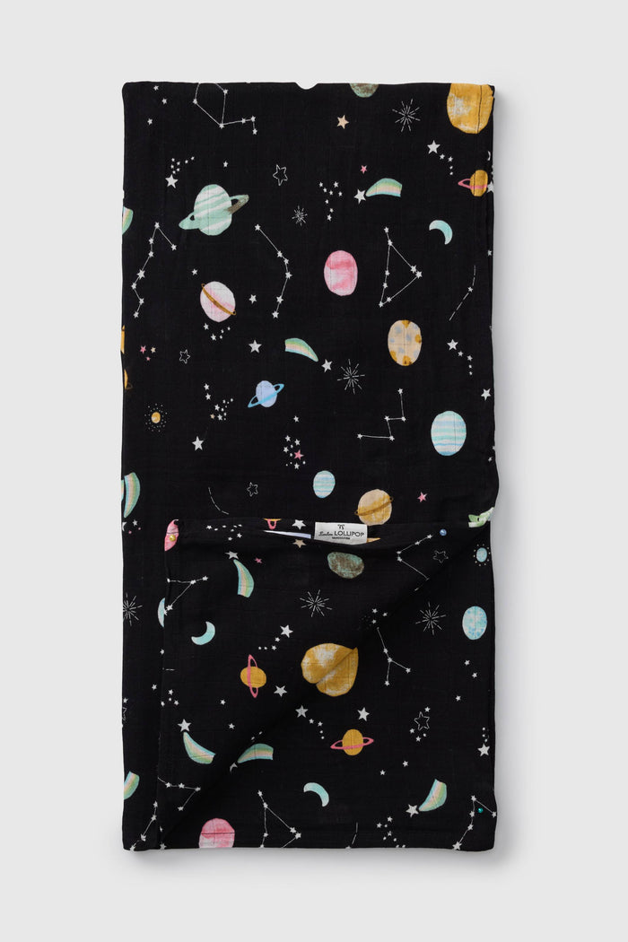Loulou Lollipop bamboo cotton muslin swaddle blanket in Planets — front view on white background
