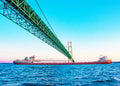 This unique perspective of a freighter traveling beneath the Mackinac Bridge by Jennifer Wohletz of Mackinac Memories evokes a sense of wonder at the bridge's strength and regional importance. &nbsp;The Mighty Mac spans across the Great Lakes to connect Michigan's upper and lower peninsulas.