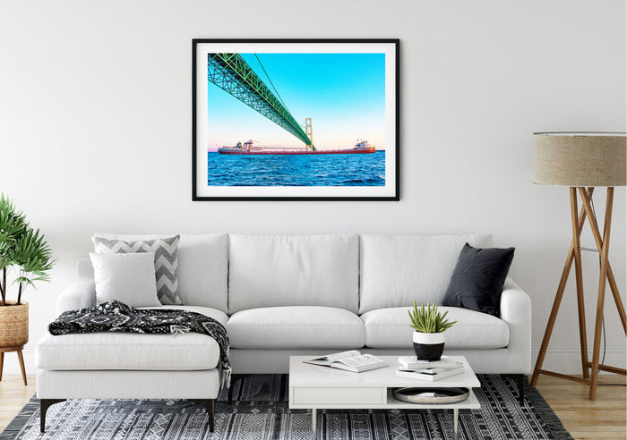 This unique perspective of a freighter traveling beneath the Mackinac Bridge by Jennifer Wohletz of Mackinac Memories evokes a sense of wonder at the bridge's strength and regional importance. &nbsp;The Mighty Mac spans across the Great Lakes to connect Michigan's upper and lower peninsulas.