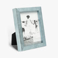 Display your photos in a soft blue frame.