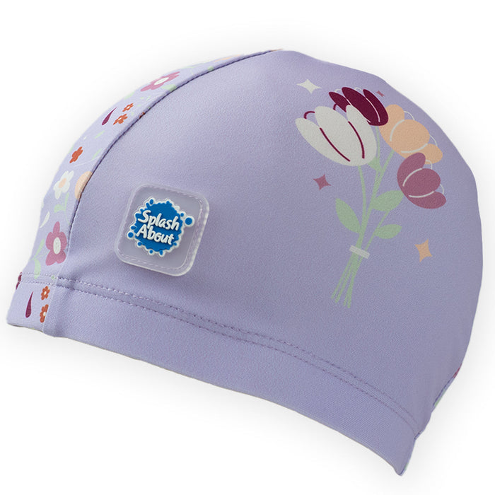 Baby swim hat in lilac featuring floral themed print.