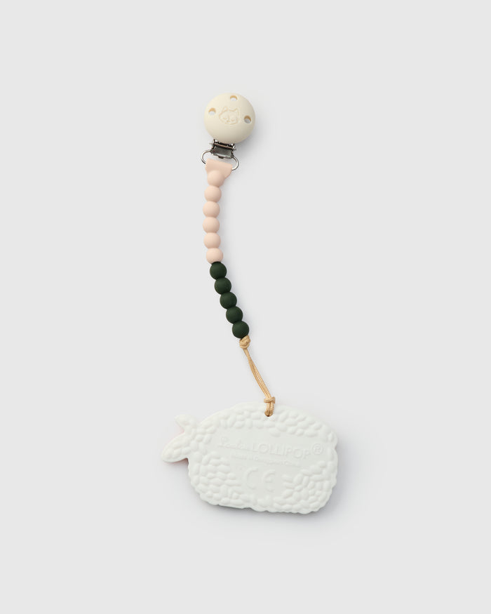 Teething ring with silicone strap on a white background