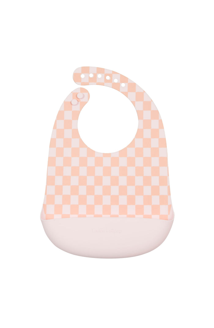 Loulou Lollipop FDA-compliant food-grade silicone baby bib in Pink Checkerboard — front view on white background