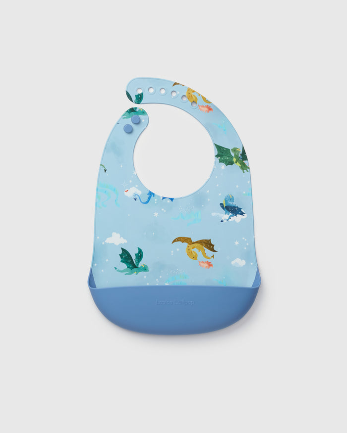Loulou Lollipop FDA-compliant food-grade silicone baby bib in Magical Dragons — front view on white background