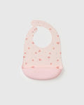Loulou Lollipop FDA-compliant food-grade silicone baby bib in Pink Seashells — front view on white background