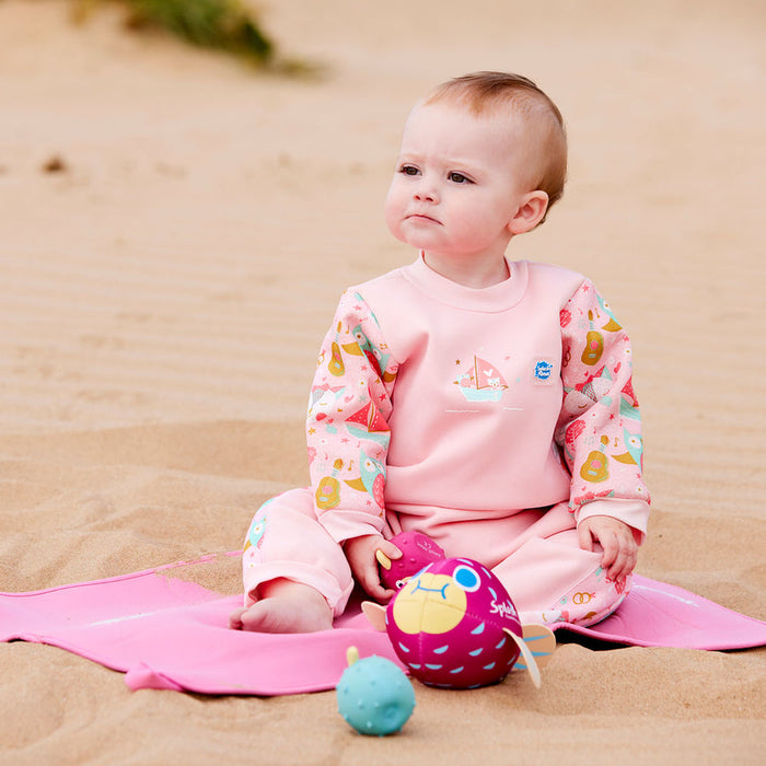 Child on neoprene mat