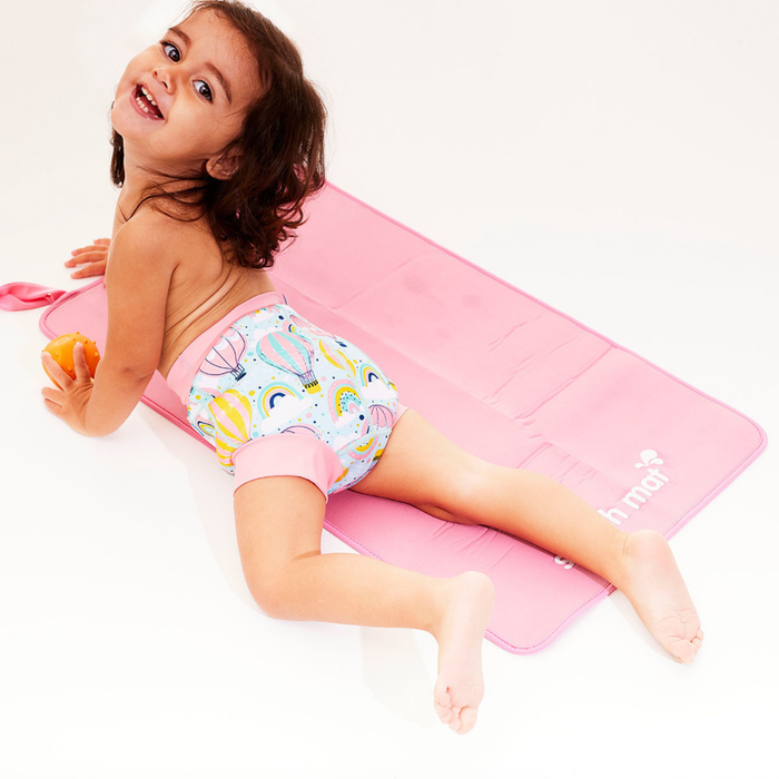 Child on neoprene mat