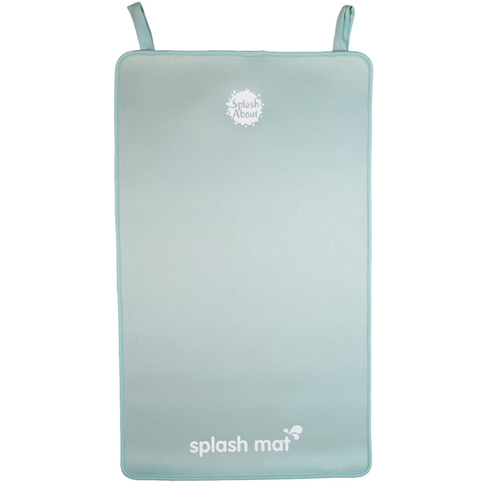 Pistachio neoprene changing mat on the floor