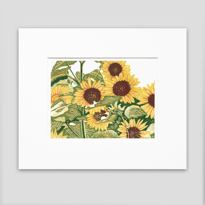 Sunflower Patch is a fun, dynamic hand-pulled and hand-carved seven-color print meant to elicit joy and a sense of belonging.  The floral art was created by Michigan printmaker Natalia Wohletz of Peninsula Prints.