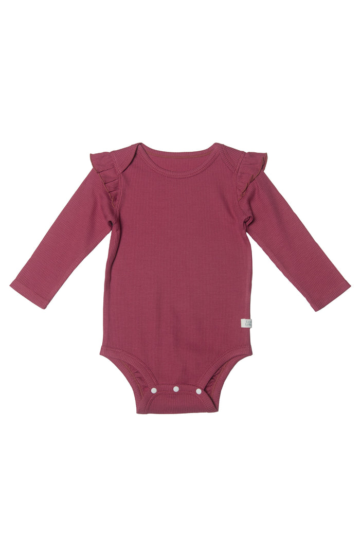 Loulou Lollipop Waffle Long Sleeve Ruffle Bodysuit in Mauvewood — front view on white background